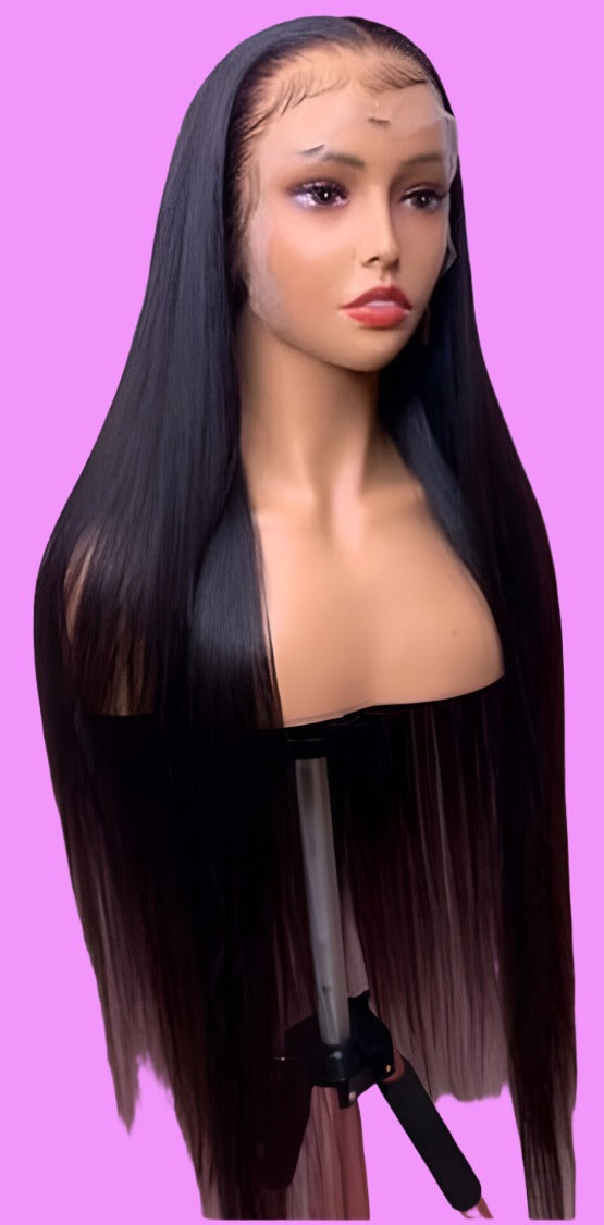 PICTURE OF OUR LONG LUXURIOUS 30 INCH STRAIGHT FLOWY UNIT ON A BEAUTIFUL MANNEQUIN TO SHOW THE QUALITY OF OUR HAIR 